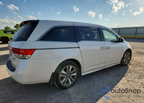 2014 Honda Odyssey Touring z USA, uszkodzony, nr VIN 5FNRL5H98EB040074